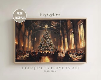May include: A framed painting depicting a large Christmas tree in a grand hall, with people gathered around tables. The tree is adorned with lights and decorations. The hall features high ceilings and large windows. The painting is presented in a light wood frame.