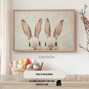 May include: A digital painting of two white bunnies with long ears, looking directly at the viewer. The bunnies are against a light beige background.
