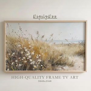 Könnte beinhalten: Ein gerahmtes Gemälde, das ein Feld mit hohem Gras und Wildblumen mit einem Strand im Hintergrund zeigt. Das Gemälde ist in einem hellen Holzrahmen und hat einen weißen Hintergrund. Der Text "HIGH-QUALITY FRAME TV ART 3840x2160" befindet sich unter dem Gemälde.