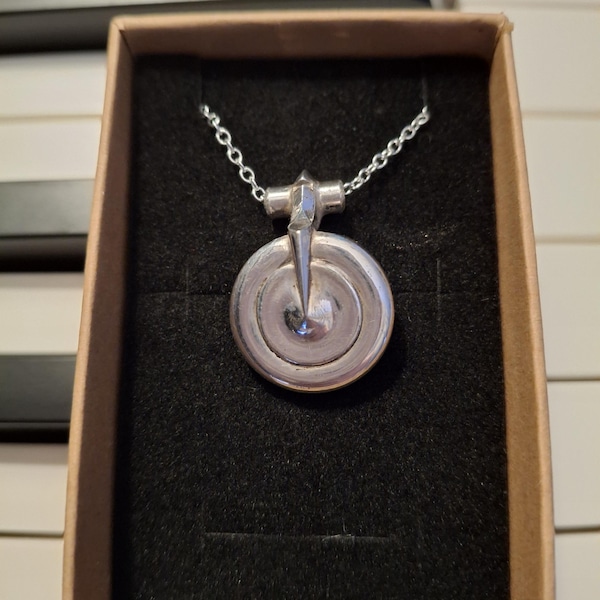 Flute key necklace, made from a recycled pointed key arm key, set on an 18 inch silver plated chain