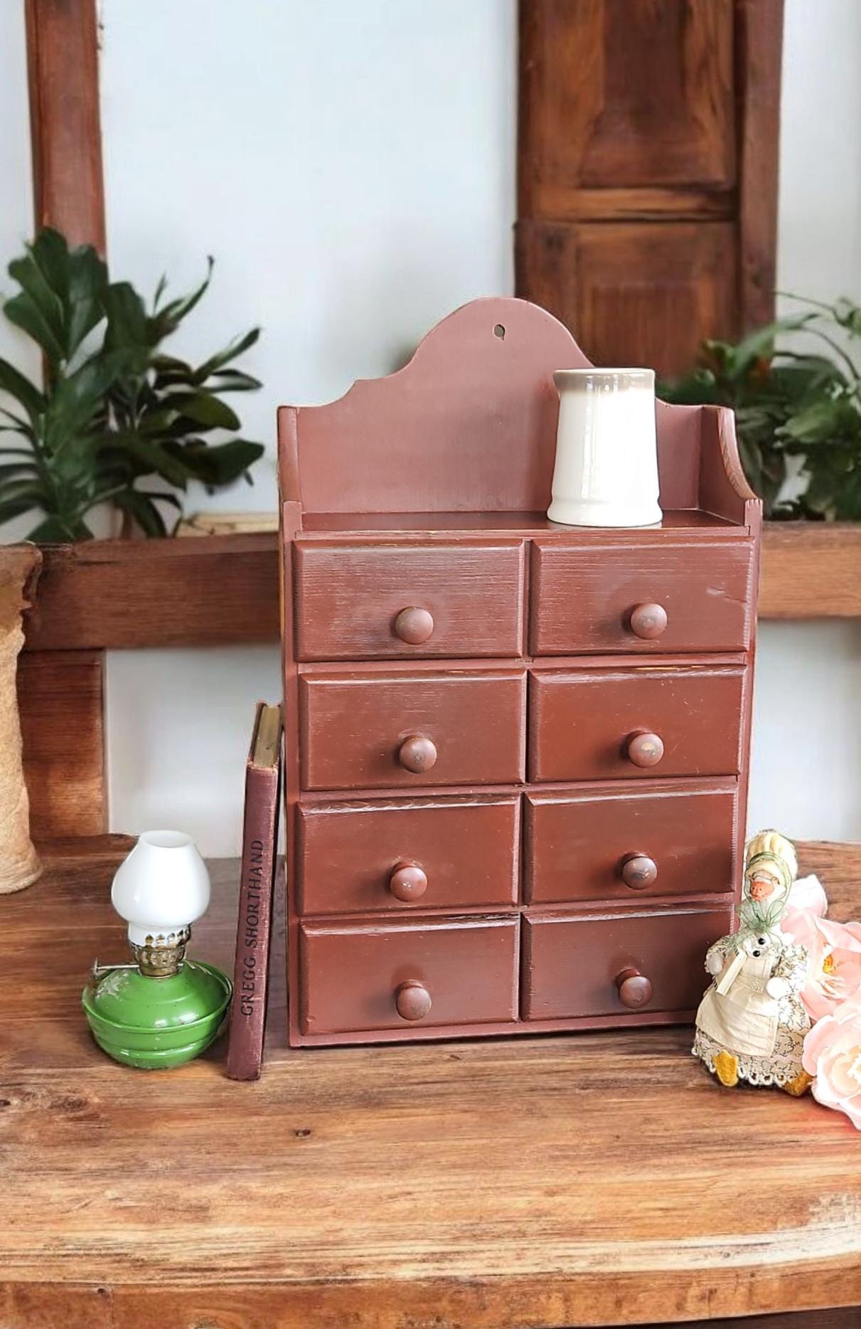 Small, wooden cabinet with multiple drawers, traditional spice storage, spice chest other kitchen storage