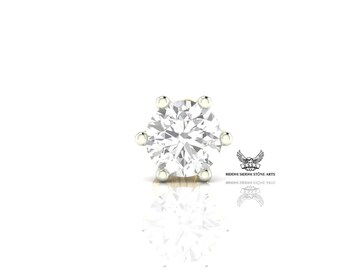 Nässtift i 14 karat gult guld med diamanter, rundslipad piercing.
