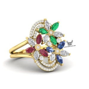 Puede incluir: Un anillo de oro con un diseño floral con piedras preciosas en forma de marquesa en verde, rojo, blanco y azul. El anillo tiene una doble banda y está adornado con pequeños diamantes redondos. Las piedras preciosas están dispuestas como flores.