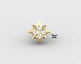 May include: A gold star-shaped earring with a cluster of clear diamonds in the center.