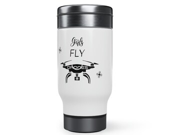 May include: White travel mug with a black and white drone graphic and the text "Girls Fly Drones".