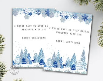 May include: Two white Christmas cards with blue snowflake and forest designs. The cards read "I never want to stop making memories with you" and "Merry Christmas". The cards have a winter theme.