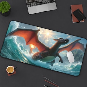 May include: A large rectangular mousepad featuring a dragon soaring over ocean waves under a bright sun. The dragon is primarily brown with orange wings and a green belly. A white computer mouse is on the right side of the mousepad.