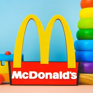 Logo McDonalds Arco McDonald stampato in 3D Gioco di ruolo Giocattolo per bambini Stampa 3D Warner Stampa 3D 20th Century Fox Pixar TVOKDIS Universal Paramount