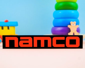 Namco Logo 3D Juegos impresos Juego retro Juego de simulación Niños Impresión de juguetes Warner Bros Impresión 20th Century Fox Pixar TVOKDIS Universal Paramount