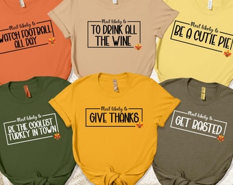 May include: A collection of six short-sleeved t-shirts in various colors, each with a humorous Thanksgiving-themed phrase in a black rectangular box. Phrases include "Watch Football All Day" and "Be a Cutie Pie".