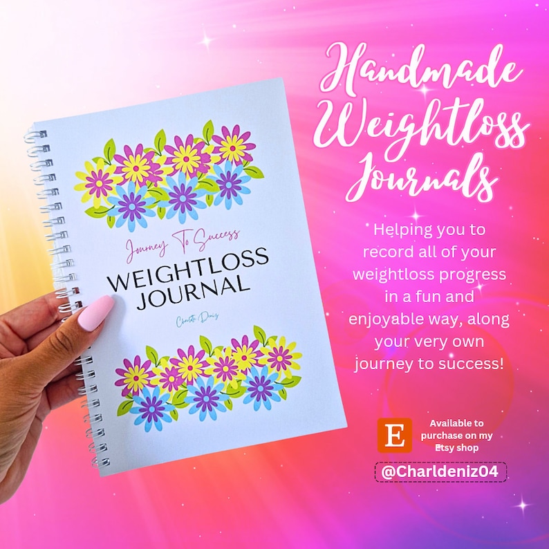 May include: A white spiral bound journal with a floral design and the text "Journey To Success Weightloss Journal" on the cover. The journal is being held by a hand. The background is a pink and orange gradient.