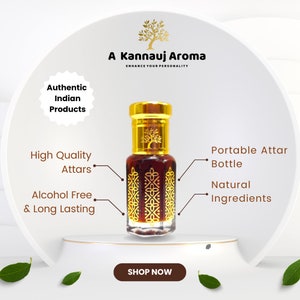 May include: A gold bottle containing a brown liquid, labelled "A Kannauj Aroma Enhance Your Personality". The bottle is on a white surface with green leaves. The text "Authentic Indian Products", "High Quality Attars", "Alcohol Free & Long Lasting", "Portable Attar Bottle", "Natural Ingredients", and "Shop Now" are also visible.
