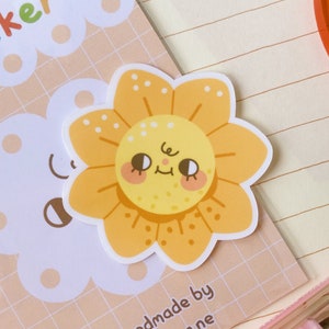 Pegatina de cara de flor de naranja