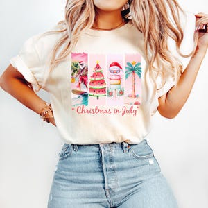 Christmas in July Santa Surfing T-shirt, Santa Surfing Summer Comfort Colors Shirt, Beach Christmas T-shirt, Tropical Christmas Family Gift