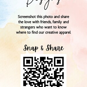 May include: A promotional graphic for "Ramble On Designs" featuring a watercolor background with text and a QR code. The text encourages sharing the photo to find creative apparel. The phrase "Snap & Share" is also included.