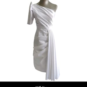 May include: White one-shoulder dress with a draped skirt and a fitted bodice.