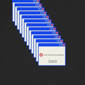 May include: Black t-shirt with a graphic of a Windows error message that reads "Task failed successfully."
