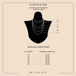 May include: A necklace length chart with a black silhouette of a neck and shoulders, displaying various necklace lengths from 12 inches to 22 inches. The chart includes both U.S. and European measurements, with corresponding lengths in centimeters.