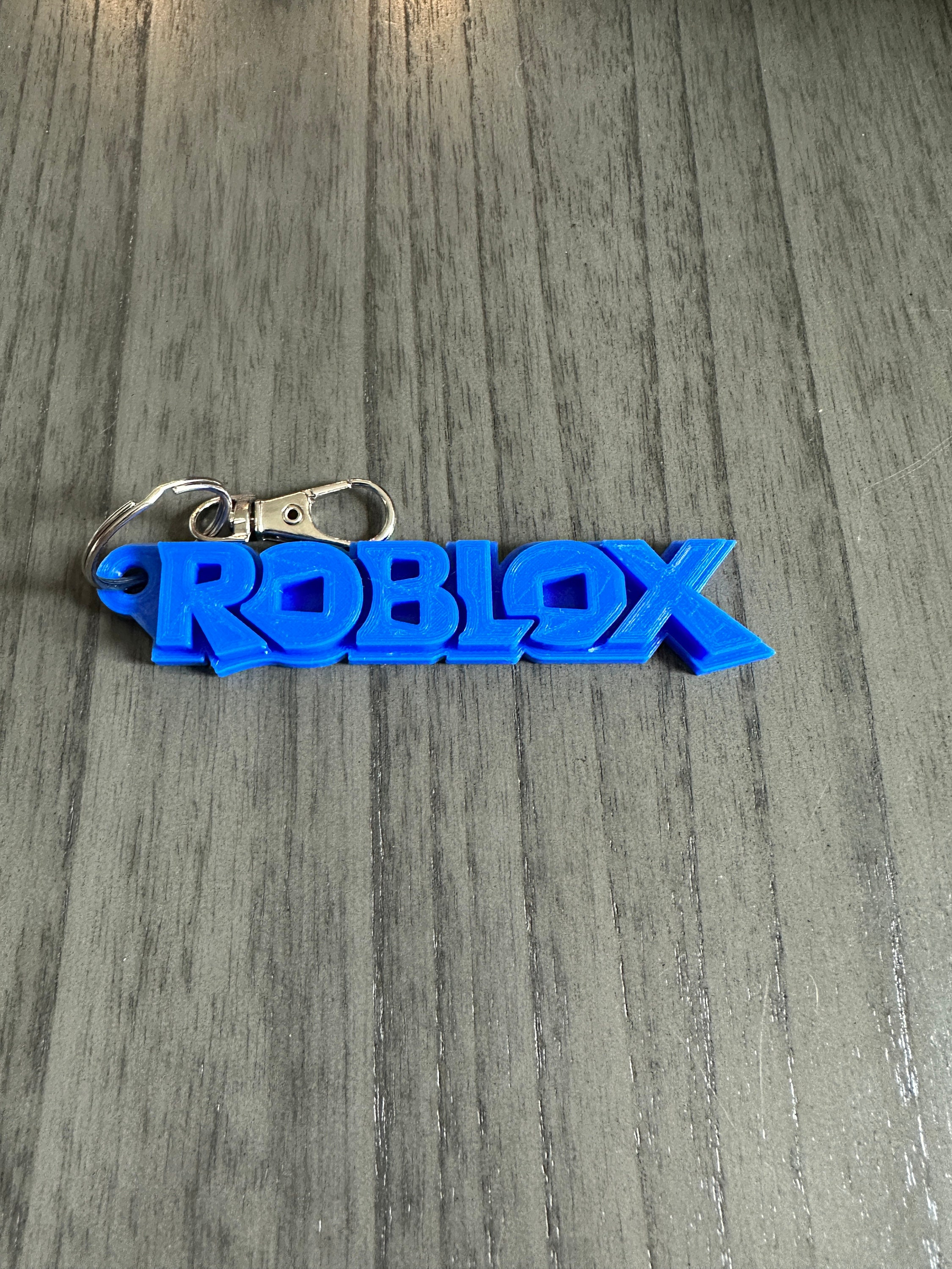 Free 3D file Roblox logo keychain 🗝️・3D printer model to