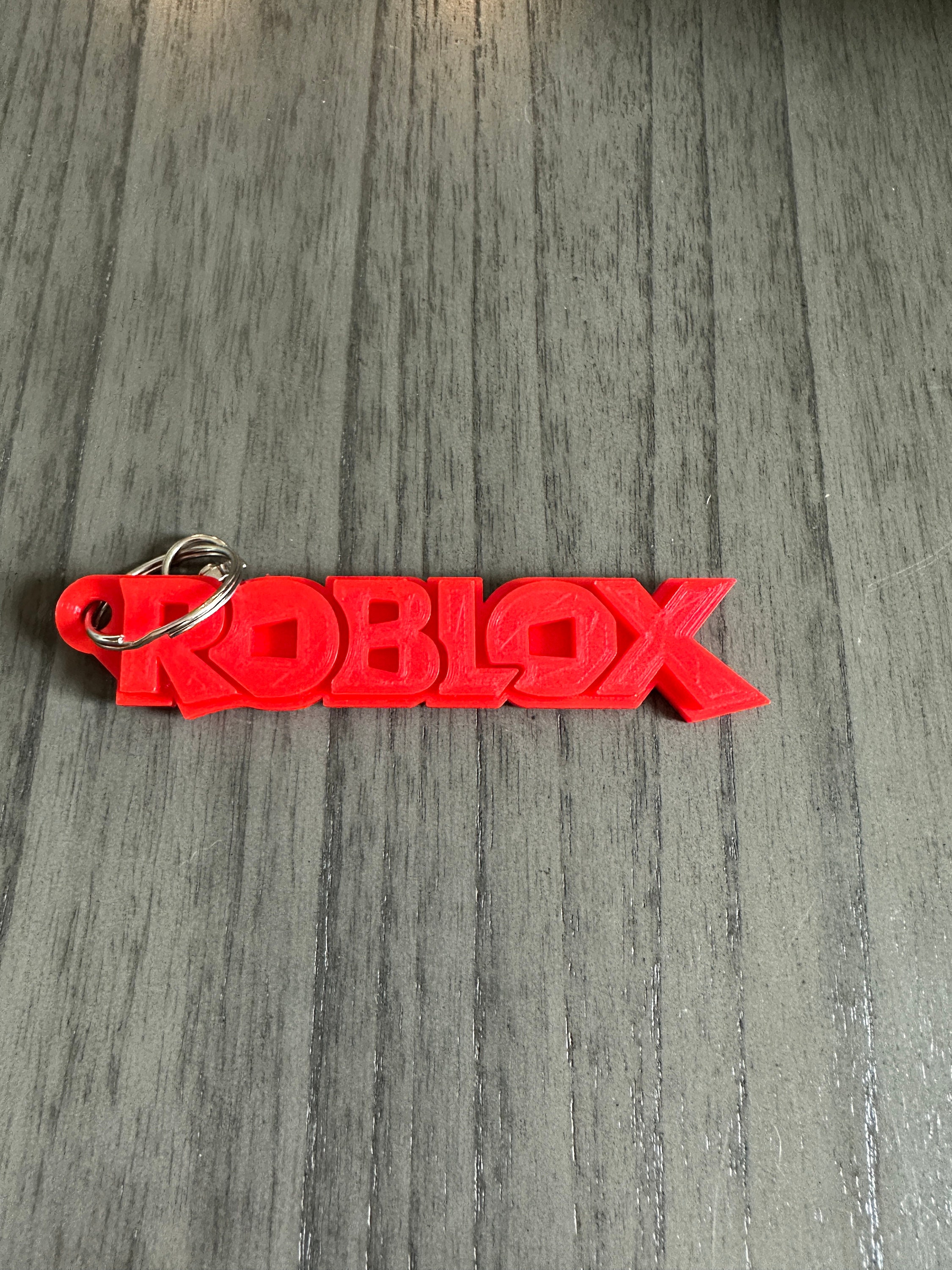 Free 3D file Roblox logo keychain 🗝️・3D printer model to