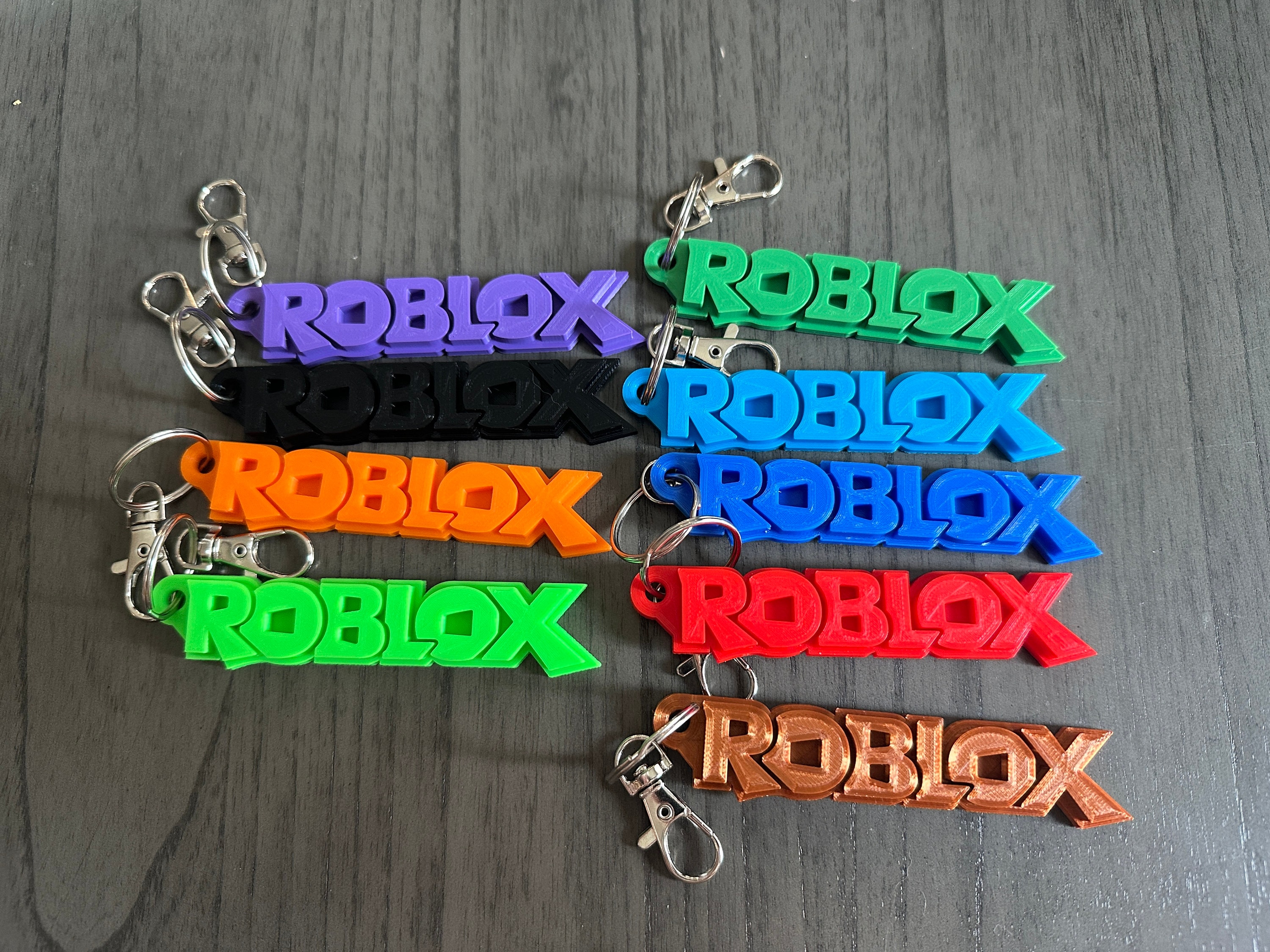 Free 3D file Roblox logo keychain 🗝️・3D printer model to