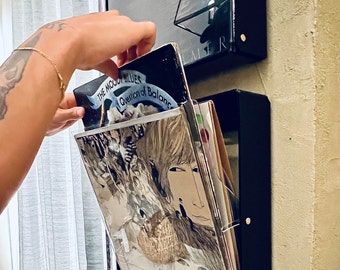 Exhibición de álbumes de discos en la pared: Almacenamiento moderno de vinilos con cajón