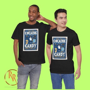 May include: Two black t-shirts featuring a vintage-style graphic of a blue and white sign that reads "Heater Halls Cocaine 5 Candy Imported by Brazil Huta".