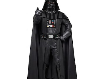 May include: A full-body Darth Vader costume featuring a black helmet, a long flowing cape, and a textured jumpsuit. The chest plate displays a control panel with red, blue, and silver buttons. The figure is pointing forward with a gloved hand.