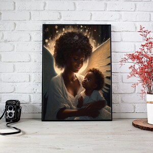May include: A painting of a Black woman with angel wings holding a Black baby. The woman is wearing a white dress and the baby is wearing a white shirt. The background is a soft glow of light.