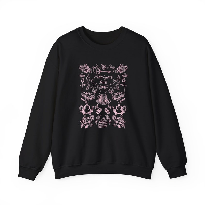 May include: Black sweatshirt with a pink graphic design featuring a key, birds, teacups, and the text "Protect your heart".