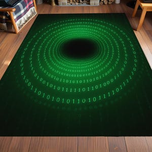 May include: A green area rug with a digital binary code design. The rug features concentric circles of green numbers against a dark green background, creating a tunnel effect. The rug is placed on a wooden floor in a room with a fireplace and a chair.