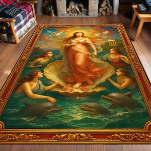 May include: A large rectangular area rug featuring a classical painting of a woman in a seashell, surrounded by figures and dolphins. The rug has a gold ornate border with a red inner frame. The artwork is set against a teal ocean background.