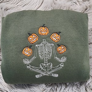 Skeleton Throwing Pumpkin Embroidered Sweatshirt or Hooded Sweatshirt
