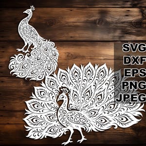 May include: Two white intricate peacock designs with detailed feathers and floral patterns. The peacocks are facing opposite directions and are cut out of paper.