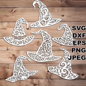 May include: Five white witch hats with intricate, swirling designs. The hats are cut out of paper and are perfect for crafting or decorating.