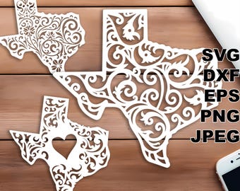 May include: Three white cut-out designs of the state of Texas with a decorative floral pattern. The designs are on a woodgrain background. The text "SVG, DXF, EPS, PNG, JPEG" is visible in the upper right corner of the image.