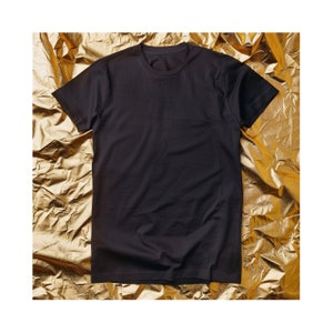 Black T-Shirt Mockup With Gold Background