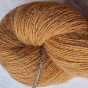 Wool yarn for knitting, High quality quality apricot yellow 100 % merino wool yarn. Natural lanolin yarn.