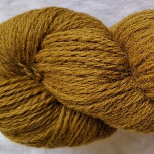 Wool yarn for knitting, High quality yellow merino wool yarn. Natural lanolin yarn.