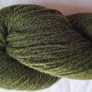 Wool yarn for knitting, High quality green wool yarn. Natural 100 % wool yarn