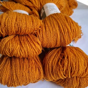 Wool yarn for knitting, High quality orange wool yarn. Natural 100 % wool yarn