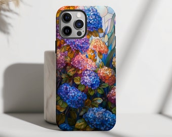 May include: A phone case with a colorful floral design featuring hydrangeas in shades of blue, pink, and orange. The flowers are depicted in a stained glass style.