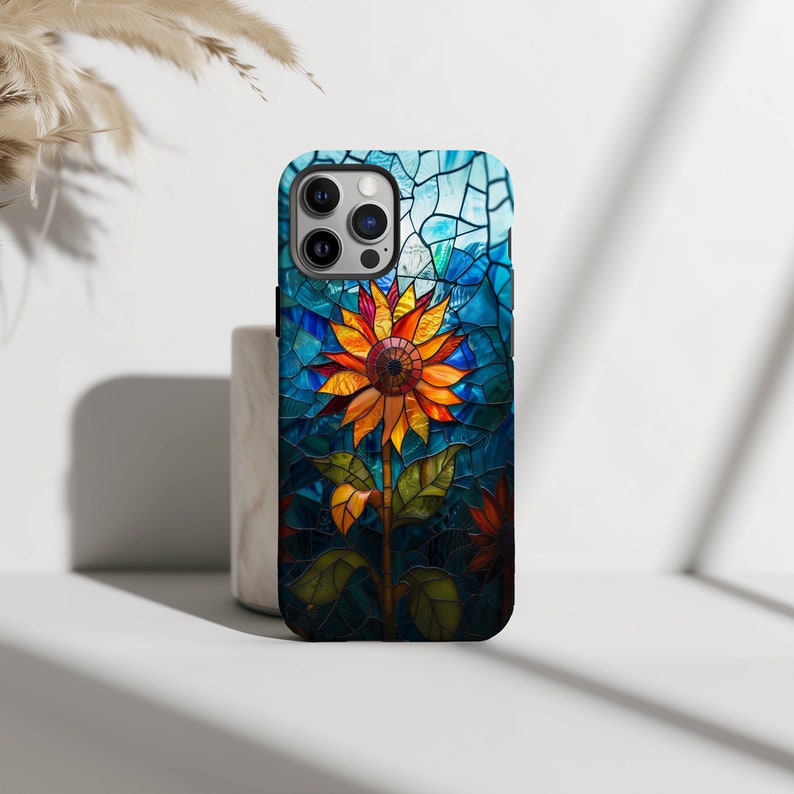 a phone case with a colorful flower on it
