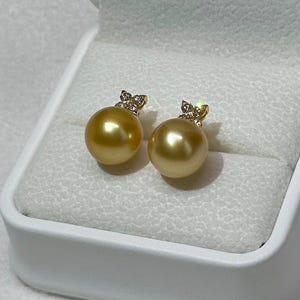 South Sea rich gold pearl strong lustre setting 18K solid yellow gold with natural diamonds stud earrings