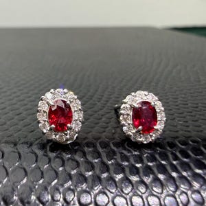 Pigeon blood Ranking Ruby stud earrings with AIGS certificate