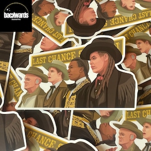 May include: A set of five enamel pins featuring a group of men wearing cowboy hats and waistcoats. The pins are all gold and black with the text "Last Chance Saloon" on them.