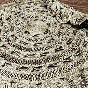 Tappeto rotondo in juta tessuto a mano: decoro boho ondulato