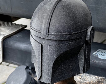 Mandalorian helmet, tow hook  cap / hitch cover. Made of black galaxy, it reflects the sun&#39;s rays and gives an amazing look.