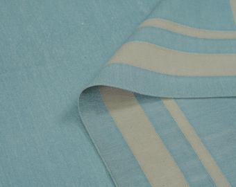 May include: A light blue fabric with two white stripes. The fabric is folded over, showing the underside of the fabric.