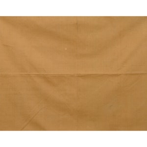 May include: A solid brown fabric swatch. The fabric has a smooth, even texture.